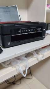 爱普生L386打印机客户一开机双灯交替闪烁、电脑那里提示需要服务